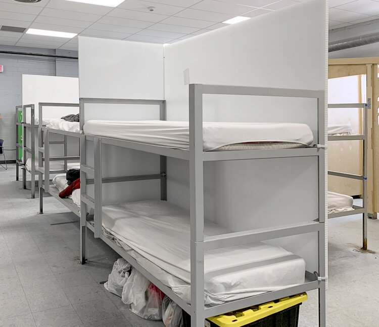 Individual shelters within the main 2100 Men’s shelter’s sleeping area designed to mitigate the spread of the virus
